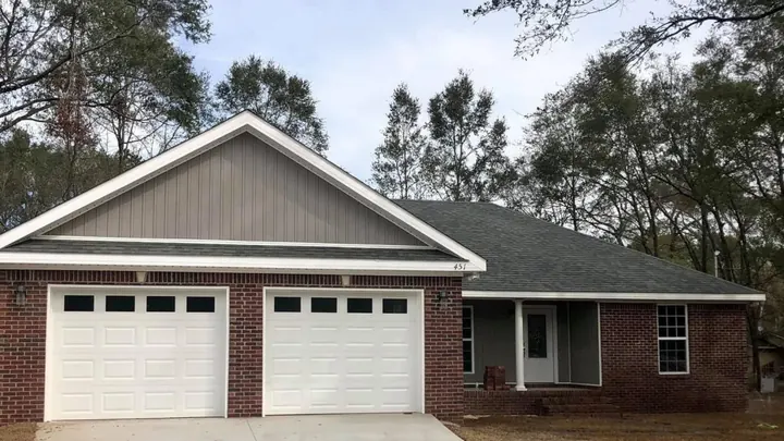 The Davenport plan: brick home with a front-entry two-car garage