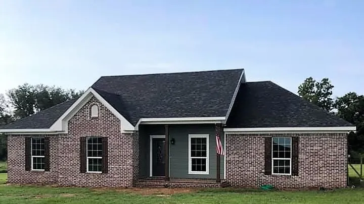 The Summerfield plan: brick home with a front gable and a small covered porch